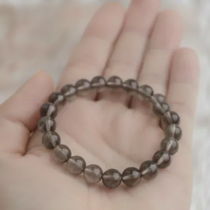 Bracelet Quartz Fumé Pierre Naturelle 8mm Grade AA 3 bracelet quartz fume dans main